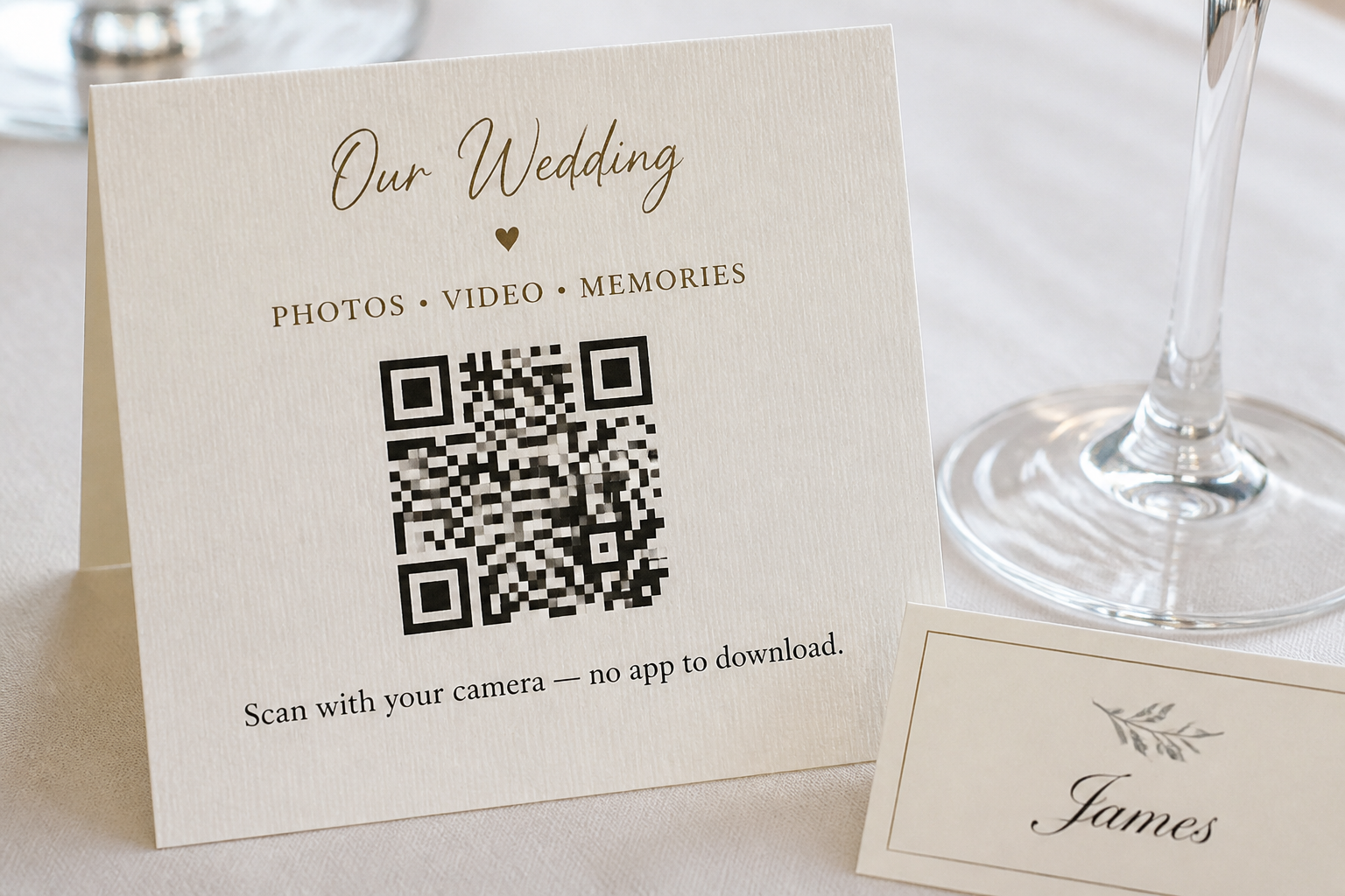 A cream table card that says scan with your camera, no app to download