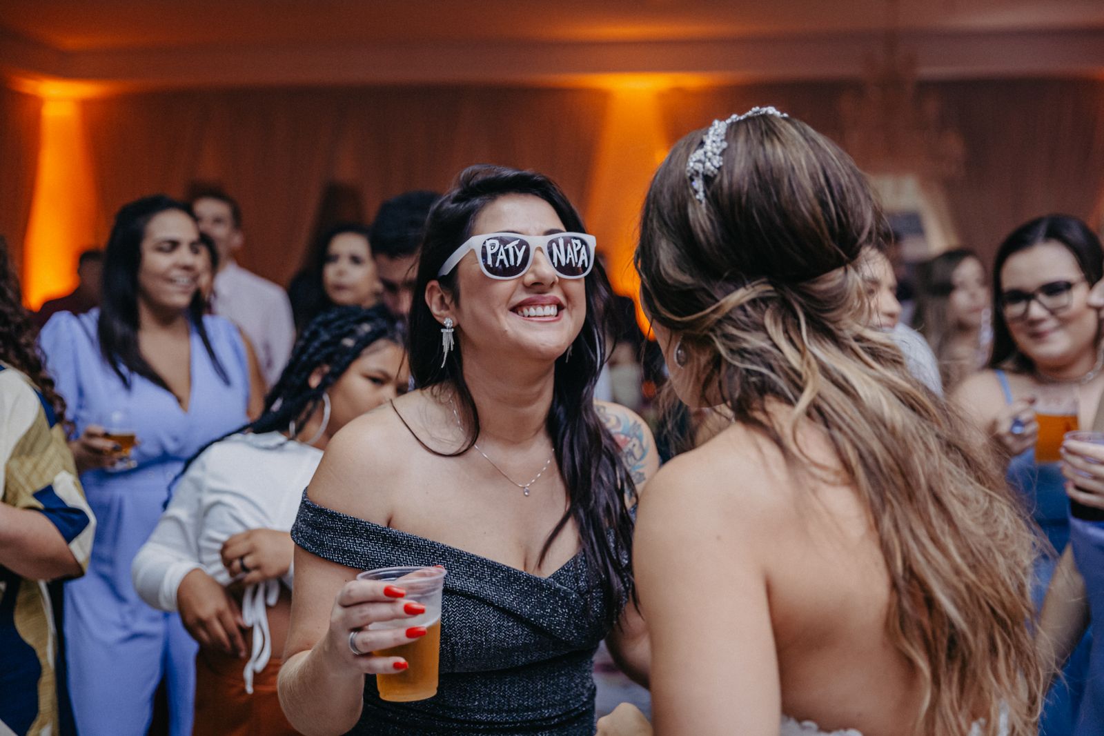 Guests celebrating together on a lively wedding dance floor