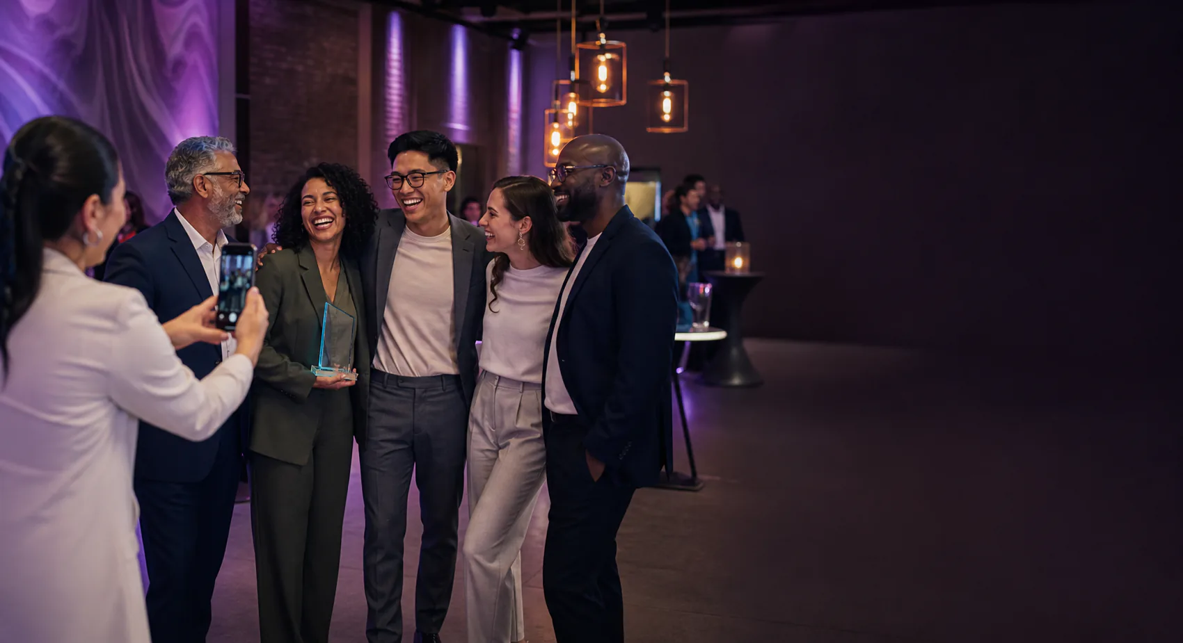 Colleagues collaborating at a contemporary company event