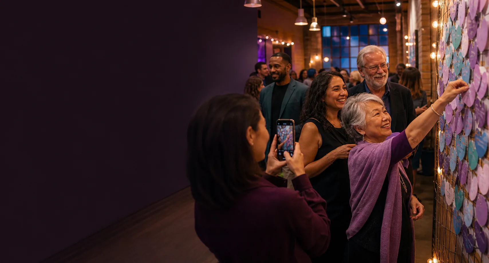 Community supporters gathered together at a fundraising event
